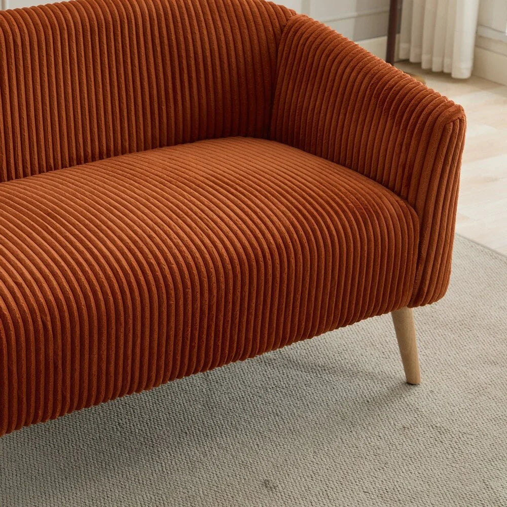 Dwuosobowa sofa tapicerowana sztruksem na drewnianych nogach w kolorze orzecha