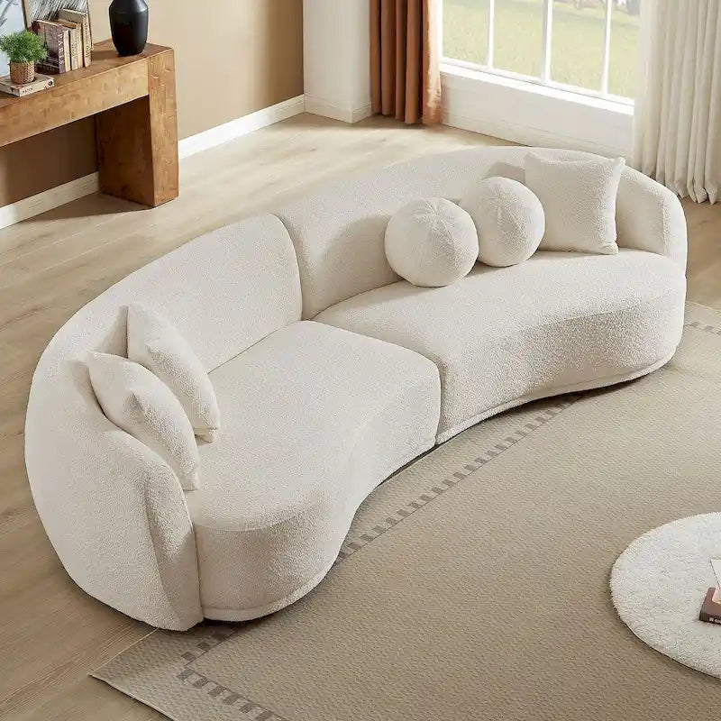 Głęboka, zakrzywiona sofa narożna, tkanina bouclé, 5 poduszek dekoracyjnych