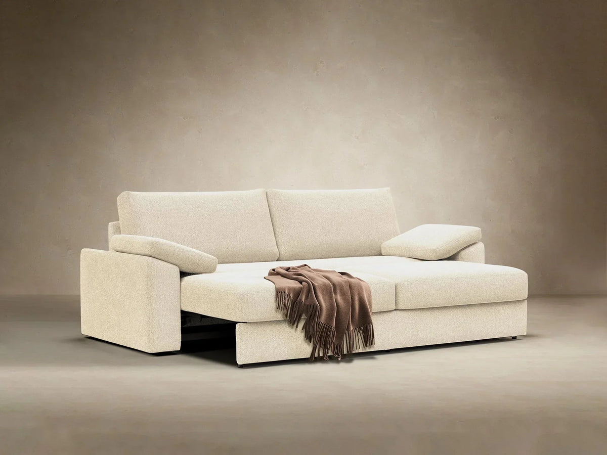 Sofa rozkładana Vilander z podłokietnikami poduszkowymi