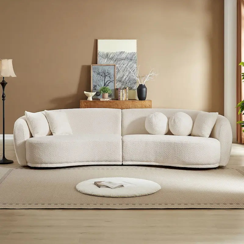 Głęboka, zakrzywiona sofa narożna, tkanina bouclé, 5 poduszek dekoracyjnych
