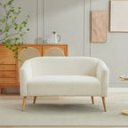 Dwuosobowa sofa tapicerowana sztruksem na drewnianych nogach w kolorze orzecha