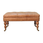Rzemieślnicza otomana Artisan Furniture ze skóry buffalo w kolorze tan, z litego drewna, na nóżkach z kółkami