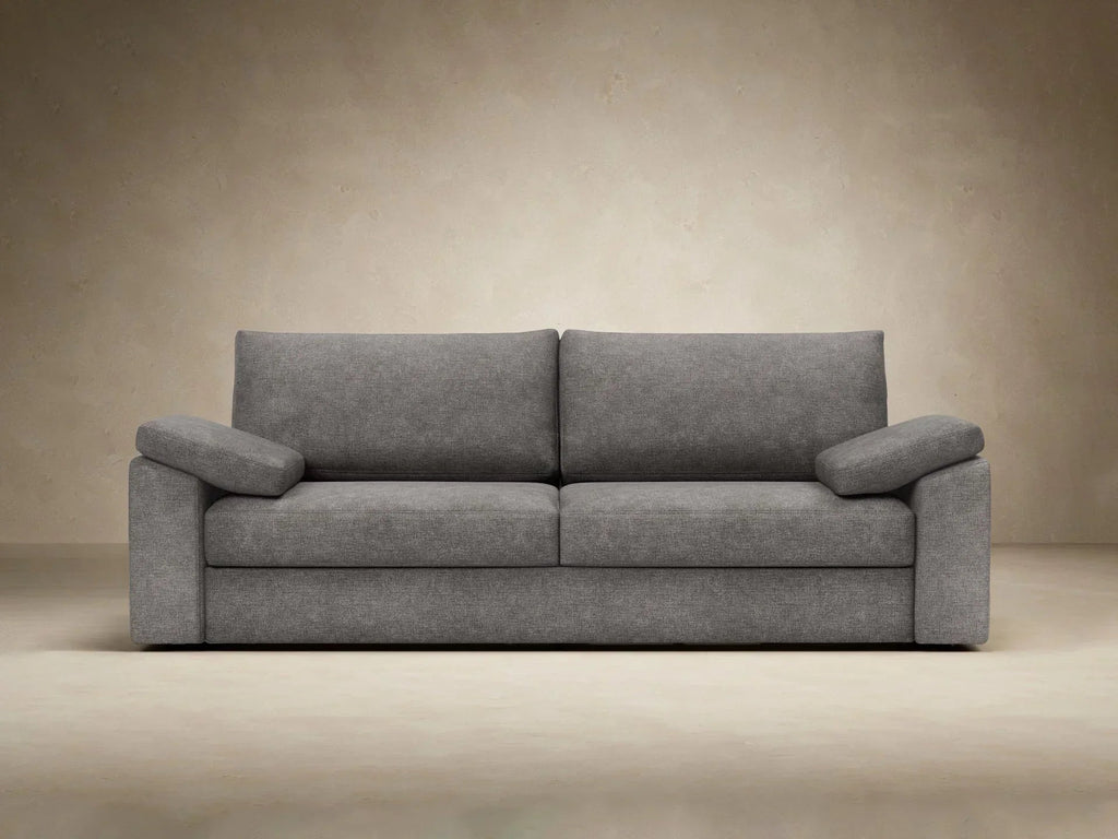 Sofa rozkładana Vilander z podłokietnikami poduszkowymi