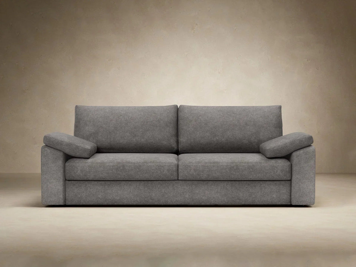 Sofa rozkładana Vilander z podłokietnikami poduszkowymi