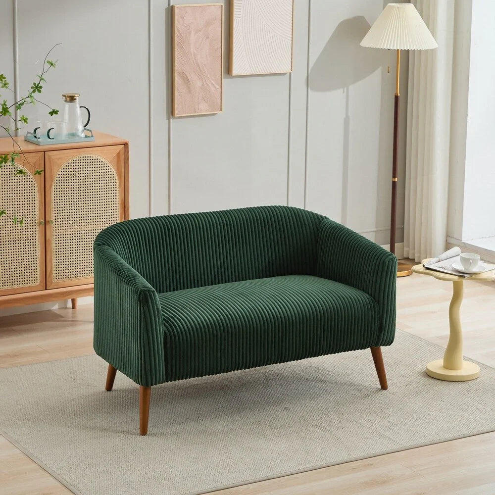 Dwuosobowa sofa tapicerowana sztruksem na drewnianych nogach w kolorze orzecha
