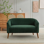 Dwuosobowa sofa tapicerowana sztruksem na drewnianych nogach w kolorze orzecha