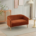 Dwuosobowa sofa tapicerowana sztruksem na drewnianych nogach w kolorze orzecha
