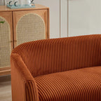 Dwuosobowa sofa tapicerowana sztruksem na drewnianych nogach w kolorze orzecha