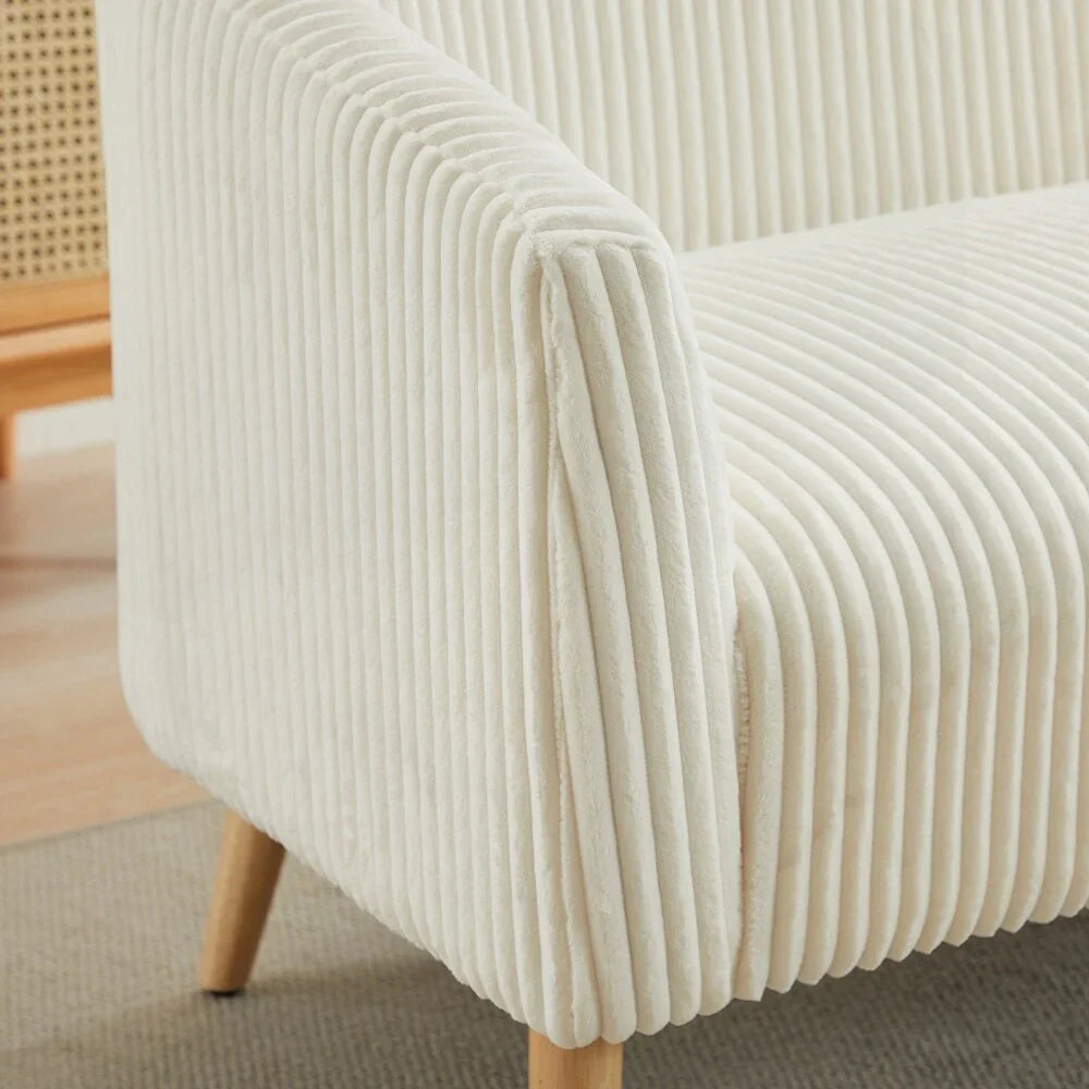 Dwuosobowa sofa tapicerowana sztruksem na drewnianych nogach w kolorze orzecha